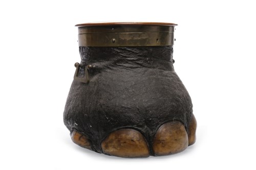 Lot 1303 - ELEPHANT'S FOOT STOOL the hinged lid enclosing...