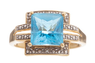 Lot 408 - TOPAZ AND DIAMOND RING