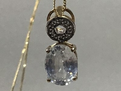 Lot 605 - A GEM SET AND DIAMOND PENDANT