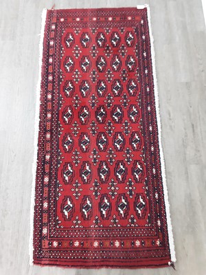 Lot 641 - A BOKHARA RUG AND TWO OTHER RUGS