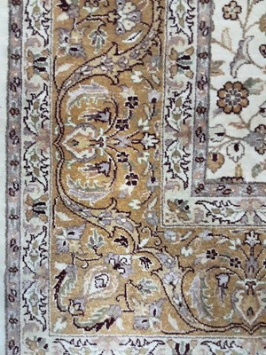 Lot 643 - AN AFRA WOOL RUG