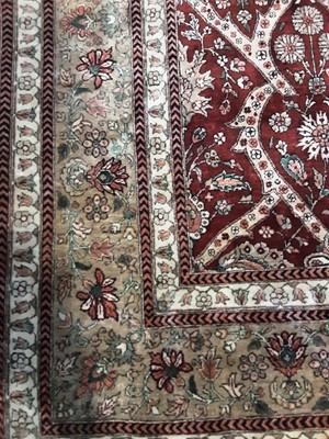 Lot 644 - AN AFRA WOOL RUG