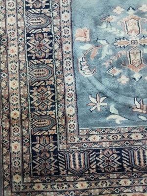 Lot 645 - AN EASTERN STYLE RUG