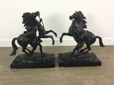 Lot 925a - A PAIR OF BRONZED SPELTER MARLEY HORSES AFTER GUILLAUME COUSTOU