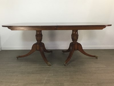 Lot 890A - A GOOD QUALITY REPRODUCTION WALNUT TWIN PEDESTAL DINING TABLE AND TEN CHAIRS