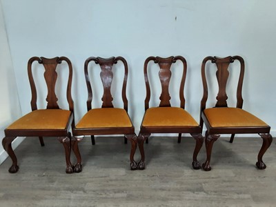 Lot 890 - A GOOD QUALITY REPRODUCTION WALNUT TWIN PEDESTAL DINING TABLE AND TEN CHAIRS