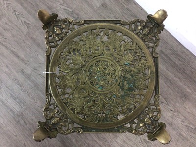 Lot 772 - A THREE TIER BRASS STAND