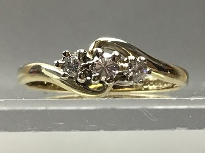 Lot 2 - A DIAMOND THREE STONE RING