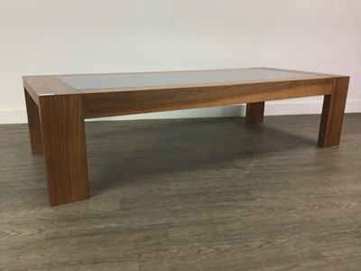 Lot 204 - A SMOKED GLASS COFFEE TABLE AND LOW CABINET