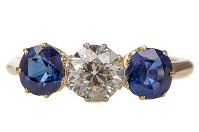 Lot 509 - SAPPHIRE AND DIAMOND THREE STONE RING