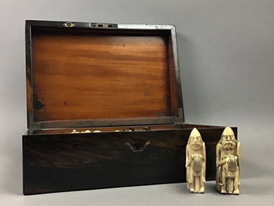 Lot 94 - A RESIN LEWIS CHESS SET IN A COROMANDEL BOX