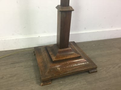 Lot 71 - A MAHOGANY STANDARD LAMP AND AN OAK STANDARD LAMP