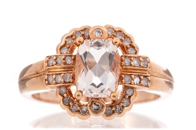 Lot 504 - MORGANITE AND DIAMOND RING