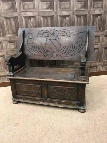 Lot 811 - EARLY 20TH CENTURY MONKS OAK BENCH the hinged...