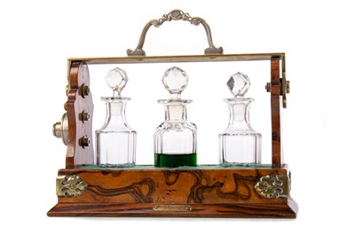 Lot 90 - BETJEMANN'S PATENT VICTORIAN THREE BOTTLE TANTALUS