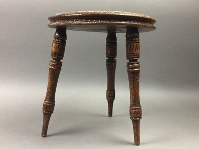 Lot 182 - AN EARLY 20TH CENTURY POKERWORK MILKING STOOL