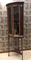 Lot 838 - MAHOGANY CORNER CABINET with moulded cornice...