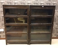 Lot 856 - TWO OAK SECTIONAL BOOKCASES each with four...