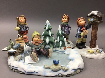 Lot 355 - FOUR HUMMEL 'WINTER TIME' FIGURES ON LAKE BASE