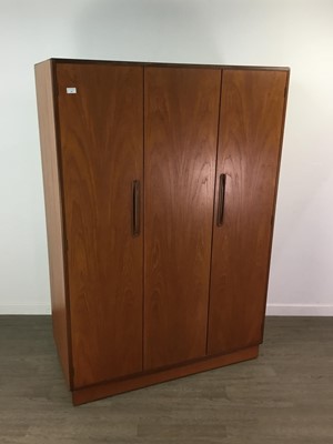 Lot 381 - A G-PLAN TEAK THREE DOOR WARDROBE