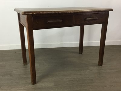 Lot 402 - AN OAK WRITING TABLE