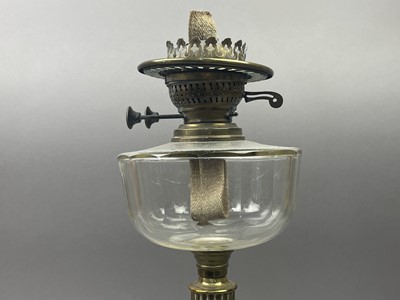 Lot 427 - A BRASS OIL LAMP