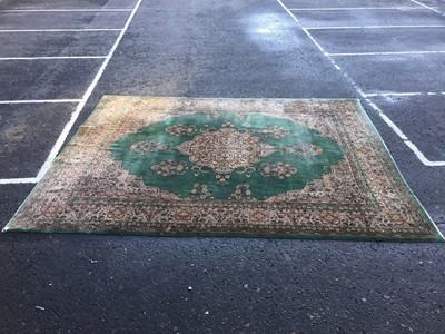 Lot 455 - A MODERN GREEN RUG