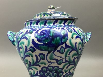 Lot 20 - PERSIAN FAIENCE STORAGE JAR AND COVER