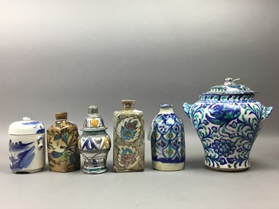 Lot 20 - PERSIAN FAIENCE STORAGE JAR AND COVER