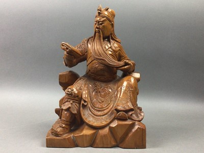 Lot 28 - POTTERY FIGURE OF A SEATED BUDDAH