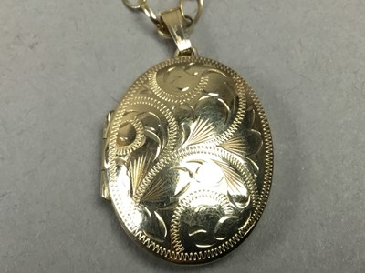 Lot 2 - NINE CARAT GOLD OVAL LOCKET PENDANT