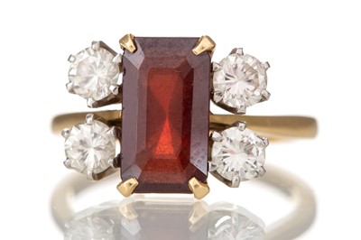 Lot 706 - GARNET AND DIAMOND RING