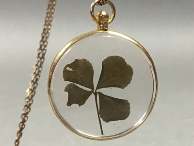 Lot 209 - NINE CARAT GOLD 'FOUR LEAF CLOVER' PENDENT ON CHAIN