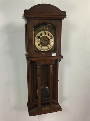 Lot 286 - ART NOUVEAU OAK WALL CLOCK