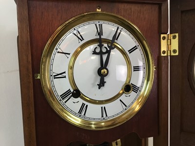 Lot 261 - MODERN OAK CASED WALL CLOCK