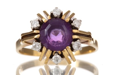 Lot 411 - PURPLE PASTE AND DIAMOND CLUSTER RING