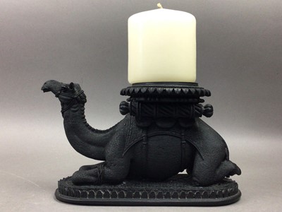 Lot 443 - EBONISED RESIN CANDLESTICK