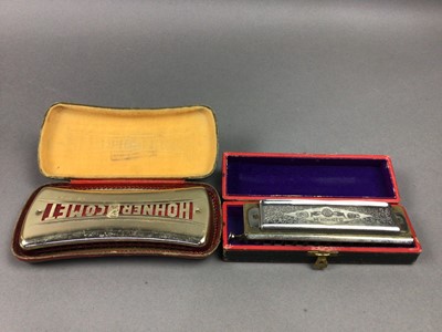 Lot 509 - THREE HOHNER MOUTH ORGANS