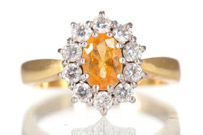 Lot 807 - YELLOW SAPPHIRE AND DIAMOND RING