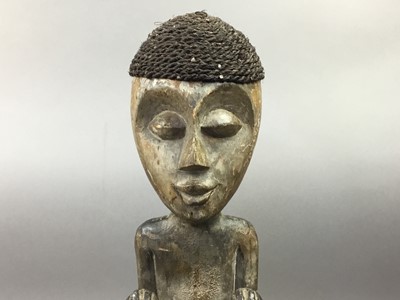 Lot 577 - AFRICAN CARVED WOOD FIGURE