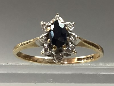 Lot 573 - SAPPHIRE AND DIAMOND CLUSTER RING