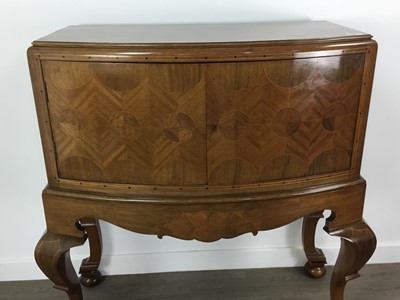 Lot 798 - CONTINENTAL MAHOGANY AND PARQUETRY BOW FRONTED DRINKS CABINET