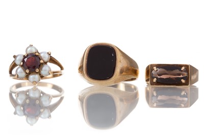 Lot 423 - THREE GOLD RINGS