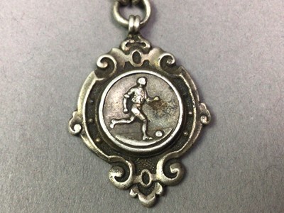 Lot 82 - SILVER FOOTBALL MEDALLION ON CHAIN