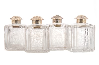 Lot 194 - SET OF FOUR VICTORIAN SILVER TOPPED CLEAR GLASS JARS