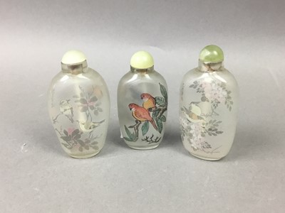 Lot 268 - THREE CHINESE REVERSE PAINTED SNUFF BOTTLES