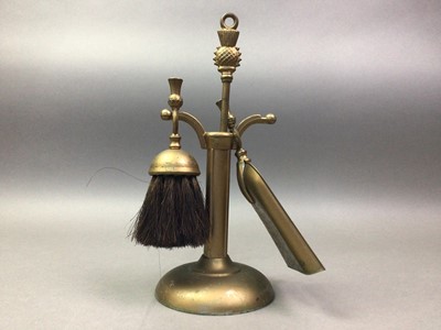 Lot 529 - TWO BRASS COMPANION SETS