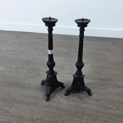 Lot 562 - PAIR OF CAST IRON CANDLESTICKS