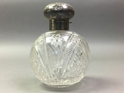 Lot 583 - SILVER TOPPED SCENT BOTTLE