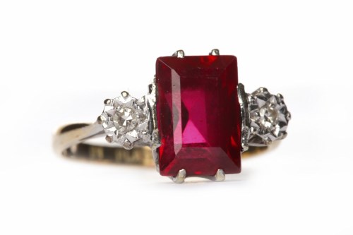 Lot 21 - CREATED RUBY AND DIAMOND THREE STONE RING the...